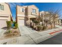 Attractive two-story home featuring a quaint facade and tidy landscaping at 6382 Lonesome Lake St, Las Vegas, NV 89148