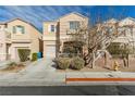 Charming two-story home with a well-maintained front yard and cozy facade at 6382 Lonesome Lake St, Las Vegas, NV 89148