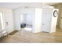 Welcoming entryway showcasing light wood floors and a neutral color palette at 7405 Painted Ridge St, Las Vegas, NV 89131