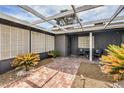 Inviting outdoor courtyard featuring a brick path and decorative landscaping at 3991 Shadow Wood Ave, Las Vegas, NV 89121