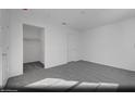 Spacious bedroom with a closet and neutral carpet, offering a blank canvas for personalization at 5733 Crenellated St # Lot 67, Las Vegas, NV 89148