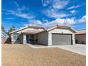 Charming single-story home featuring a well-maintained yard and a two-car garage at 1334 Shimmering Glen Ave, Henderson, NV 89014