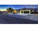 Charming single-story home with manicured landscaping, three-car garage, and RV parking at 1630 Sundown Dr, Henderson, NV 89002