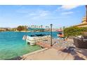 Private boat dock with a sunshade and inviting waters, perfect for lakeside living at 3173 Lido Isle Ct, Las Vegas, NV 89117