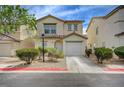 Inviting two-story home features well-maintained landscaping, an attached garage, and a cozy front entrance at 4224 Glisan Ct, Las Vegas, NV 89129