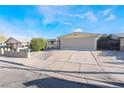 Charming single-story home featuring a spacious driveway and a well-maintained front yard at 4363 Del Santos Dr, Las Vegas, NV 89121