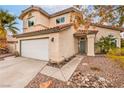 Charming two-story home with a two-car garage and xeriscaping at 650 Hermosa Palms Ave, Las Vegas, NV 89123