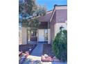 Home entrance with a decorative rock garden leading to the front door at 1655 Morse Arberry Ave, Las Vegas, NV 89106