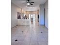 Bright and airy living room featuring tile flooring and natural light at 1655 Morse Arberry Ave, Las Vegas, NV 89106