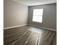 Comfortable bedroom featuring hardwood floors and a window at 2451 N Rainbow Blvd # 1156, Las Vegas, NV 89108