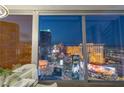 Dining area featuring floor-to-ceiling windows with stunning city views at 3722 Las Vegas Blvd # 2904, Las Vegas, NV 89158
