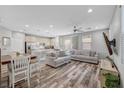 Spacious living area with stainless appliances and a seamless flow to the backyard at 10397 Skye Canyon Falls Ave, Las Vegas, NV 89166