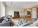 Open living space with sleek furniture, hardwood floors, and a dining area at 3750 Las Vegas Blvd # 3510, Las Vegas, NV 89158