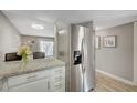 Open concept kitchen with stainless steel appliances at 3823 S Maryland Pkwy # T8, Las Vegas, NV 89119