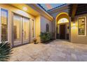 Elegant courtyard featuring stone flooring and seamless indoor-outdoor living at 5 Circa De Montanas, Henderson, NV 89011
