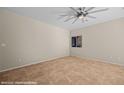 Cozy bedroom with natural light and tile flooring, offering a serene retreat at 730 Hardy Way # A, Mesquite, NV 89027