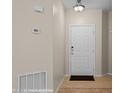 Inviting entryway with tile floors and a secure front door, ensuring a warm welcome at 730 Hardy Way # A, Mesquite, NV 89027