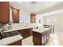 Bright kitchen featuring stainless steel appliances, updated countertops, and an island at 7904 Fantail Dr, North Las Vegas, NV 89084