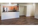 The kitchen opens to the living room and features stainless steel appliances at 9325 W Desert Inn Rd # 110, Las Vegas, NV 89117
