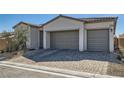 Charming one-story home boasting a three-car garage, stone accents, and a neatly landscaped front yard at 10239 Meandering Dell Ave, Las Vegas, NV 89166