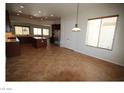 Open dining area with recessed lighting, tile floors, and a view into the kitchen area at 2324 Orangeburg Pl, Henderson, NV 89044