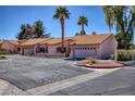 Attractive single-Gathering home boasts a tile roof, desert landscaping, and a two-car garage at 2699 Aldonza Dr, Henderson, NV 89014