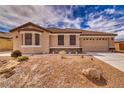 Beautiful single-story house with a two-car garage, rock landscaping, and an inviting beige color scheme at 3891 Sedgwick, Pahrump, NV 89061