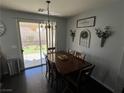 Bright dining room with backyard access and space for Gathering gatherings at 4107 Macadamia Dr, Las Vegas, NV 89115