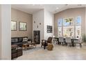 Bright living and dining areas with high ceilings, neutral walls and lots of natural light at 8894 Don Horton Ave, Las Vegas, NV 89178