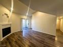 Cozy living room with fireplace and sliding glass doors for plenty of natural light at , Henderson, NV 89014