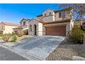 Two-story home with a two-car garage and desert landscaping for low maintenance at 2664 Strichen Ave, Henderson, NV 89044
