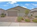 Charming single-story home featuring a low maintenance desert landscaped front yard at 333 Aravalli Crest St, Henderson, NV 89015