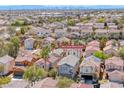 Aerial view of a neighborhood featuring many two-story homes and mature landscaping at 4921 Lazy Day Ct, Las Vegas, NV 89131