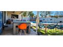 Outdoor patio featuring dining and lounging areas near a swimming pool, great for entertaining at 5318 Palmyra Ave, Las Vegas, NV 89146