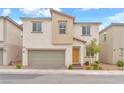 Inviting two-story home with a neutral color scheme and a two-car garage at 6952 Crimson Shadow St, North Las Vegas, NV 89086