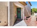 Charming front door decorated with seasonal decor and a welcome mat at 9692 Waukegan Ave, Las Vegas, NV 89148