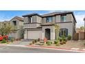 Charming two-story home features a tile roof, two-car garage, and landscaped front yard at 9993 Birch Knoll Ave, Las Vegas, NV 89166