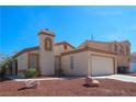Lovely single-story home with two-car garage, desert landscaping, and eye-catching architectural detail at 1636 Royal Palm Dr, Las Vegas, NV 89128