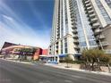 Modern high-rise building featuring sleek architecture and multiple balconies near a city street at 200 W Sahara Ave # 3909, Las Vegas, NV 89102