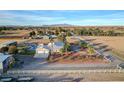 Expansive horse property featuring a pool, multiple structures, and mountain views at 2125 Mateuse St, Logandale, NV 89021