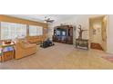 Spacious living room with plush seating, neutral tones, and elegant decor at 2320 Anderson Park Dr, Henderson, NV 89044