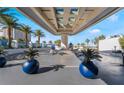 Grand entryway with fountain, porte cochere and blue decorative planters at 2700 Las Vegas Blvd # 4101, Las Vegas, NV 89109