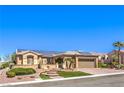 Inviting single-story home featuring desert landscaping, charming walkway and solar panels at 2776 White Sage Dr, Henderson, NV 89052