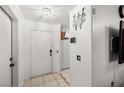 Clean entryway featuring tile flooring and a white front door at 388 Coronado Dr, Henderson, NV 89015