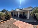 Enjoy the spacious back patio, perfect for outdoor dining and entertaining at 5000 Burr Oak Dr, Las Vegas, NV 89130