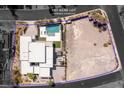 Expansive property featuring a modern home with a pool and an adjacent vacant homesite at 505 Dragon Gate Ct, Henderson, NV 89012