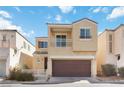 Charming two-story home featuring a balcony, two-car garage and manicured landscaping at 7486 River Dove Ct, Las Vegas, NV 89139