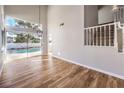 Bright living room with high ceilings and views of the pool at 2916 Cape Verde Ln, Las Vegas, NV 89128
