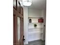 Warm entryway featuring an open view with modern shelving on neutral-colored walls at 3484 Nightflower Ln # 2, Las Vegas, NV 89121