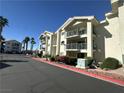 Image presenting condos with balconies and nicely manicured bushes and grass at 3550 Bay Sands Dr # 3044, Laughlin, NV 89029